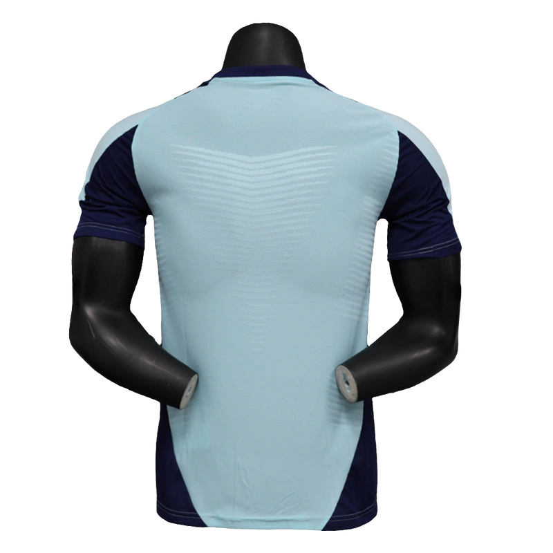 Camisa Arsenal 24/25 Pré-Jogo - Azul Claro - Versão Jogador